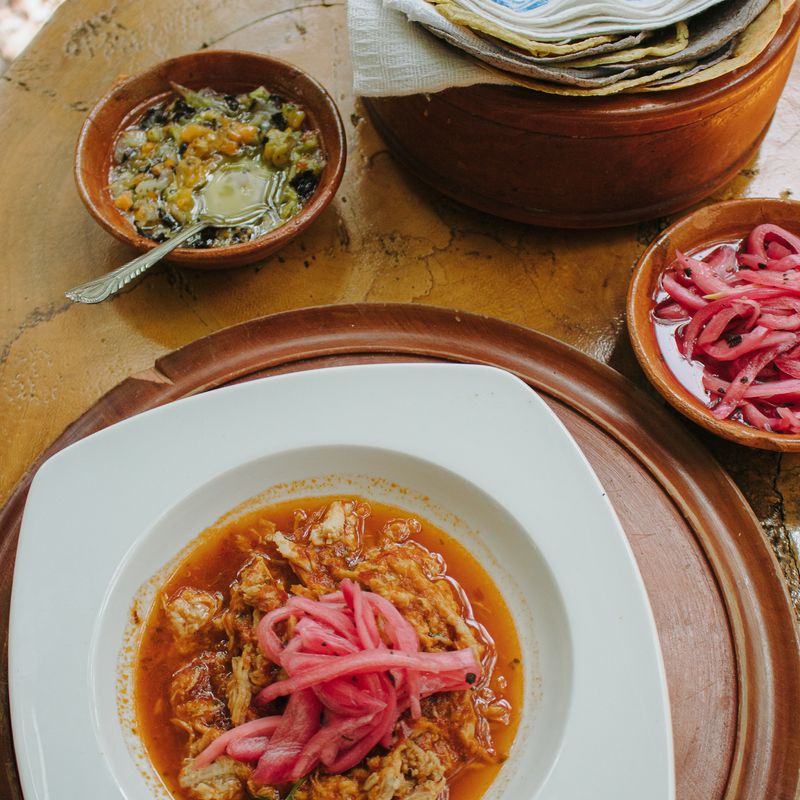Cochinita pibil served at Raíces y Sabores